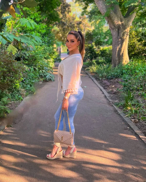 Bella Morgane in jeans and wedges 