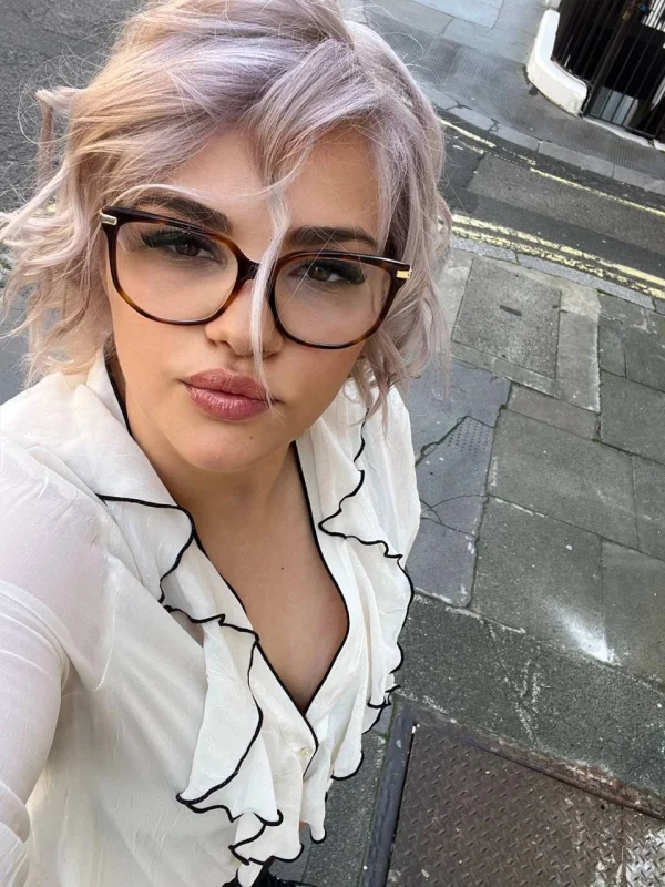 Phoenix is looking sexy in this selfie of her wearing glasses 