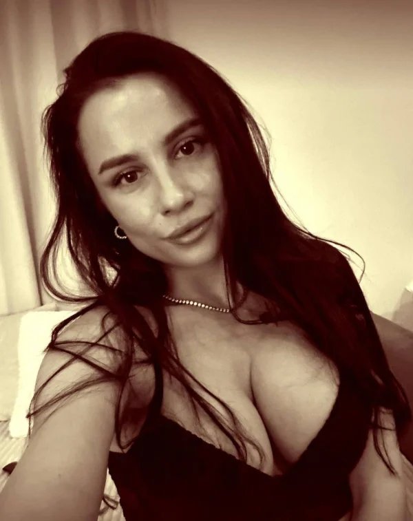 A black and white selfie of Nina a very sexy escort 