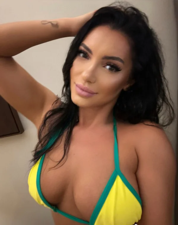 Famous London escort  Kylie is pictured wearing a bikini 