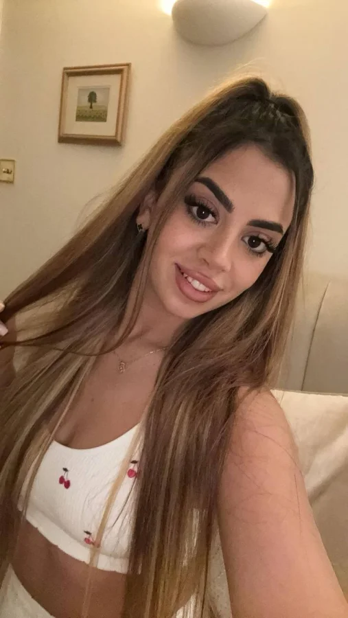 Soraya is looking very sexy wearing a white bra top 