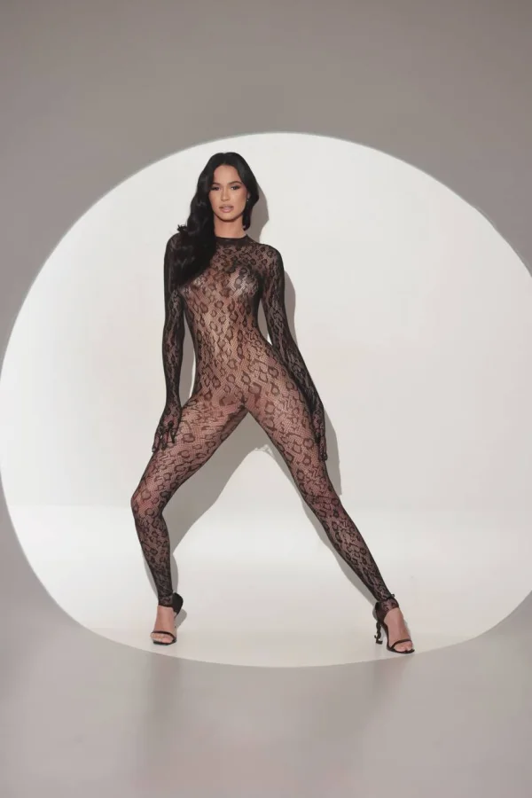 Bernadette is pictured wearing a body stocking and very high very strappy heels 