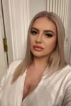 Addison looks very sexy in a white robe 